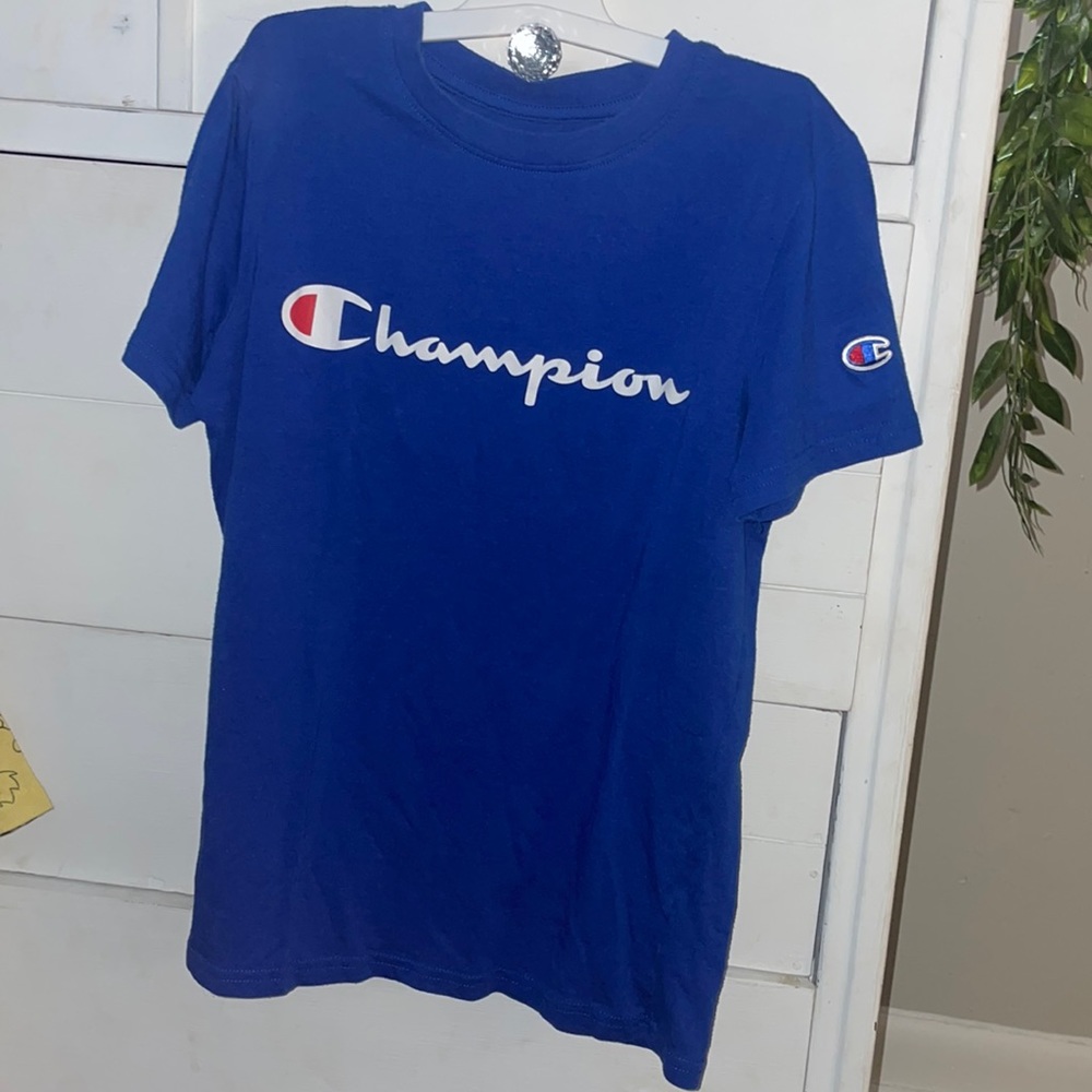 a blue champion shirt